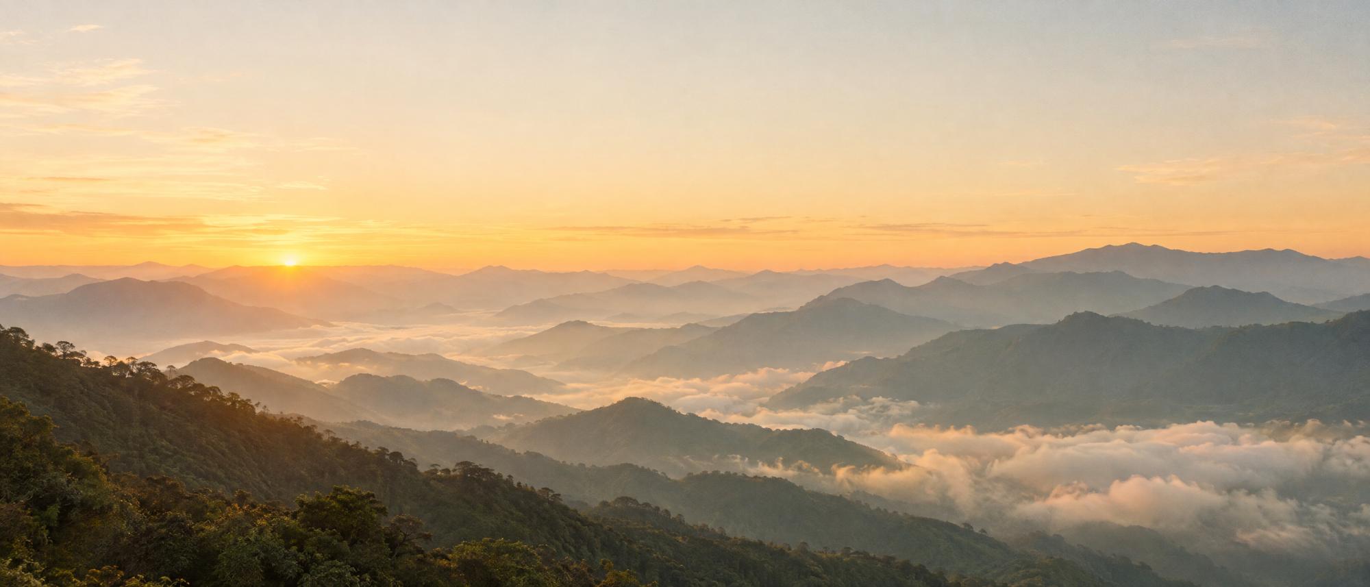 Sunrise over mountains and a sea of cloud